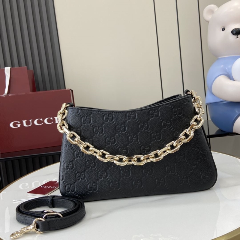 G*u*i top handle bags